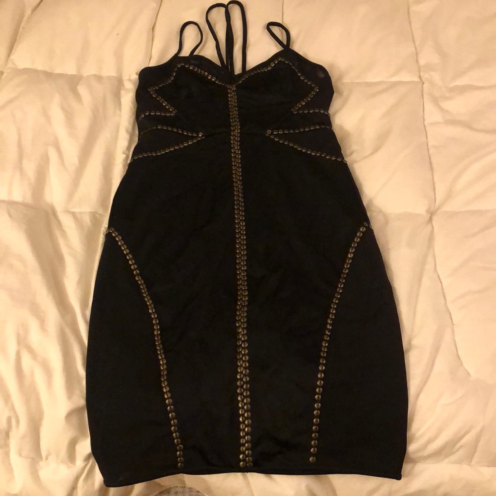 Like new, bebe strapped dress